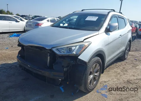 2015 Hyundai Santa Fe Sport 2.4L z USA, uszkodzony, nr VIN 5XYZUDLB7FG277165